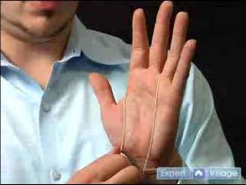 Magic Tricks Revealed : Learn Popular Illusions Free : The Jumping Rubber Band Illusion Revealed